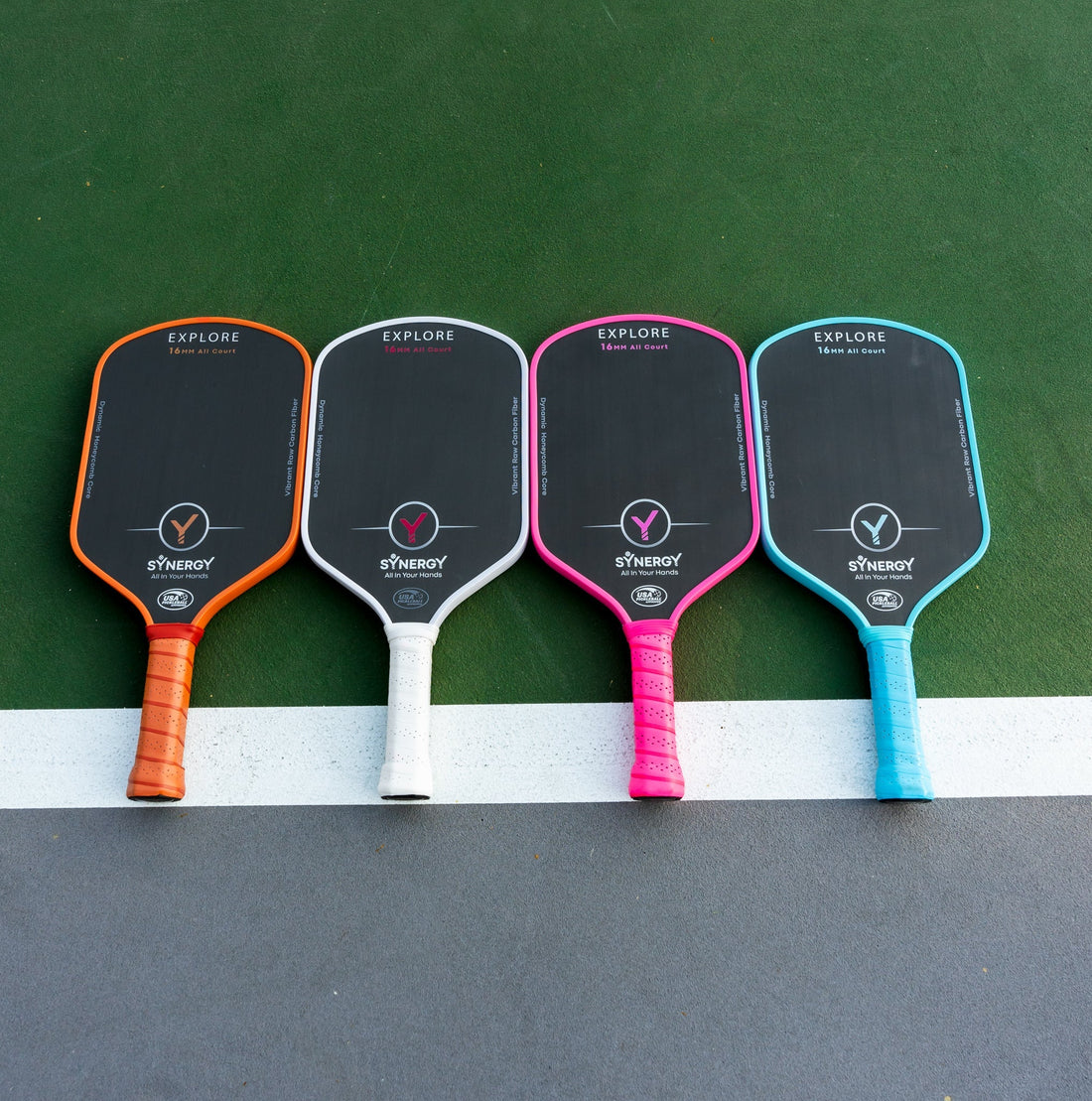 Pickleball player using a Synergy paddle on court