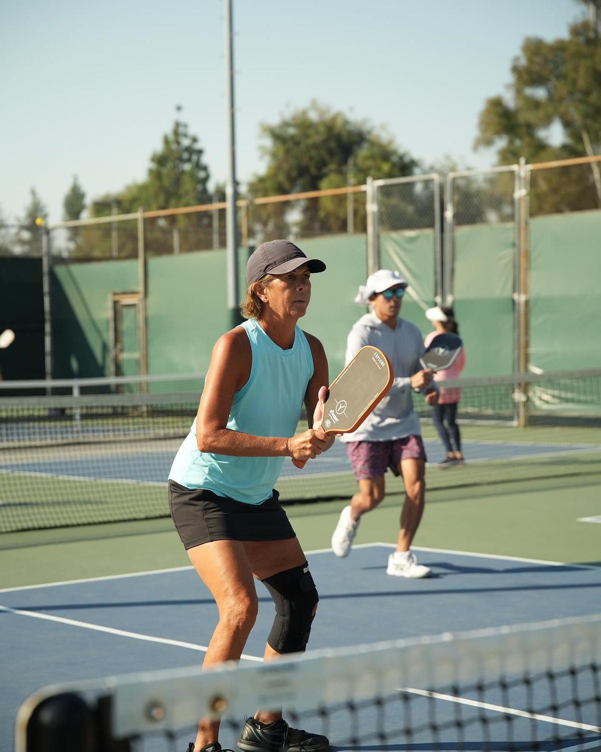Real recreational pickleball players playing together